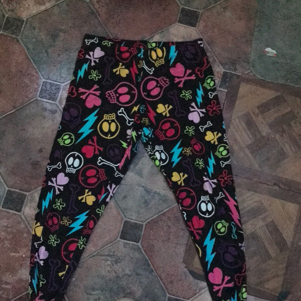 Black leggings with colorful skeleton design. Large (11-13)